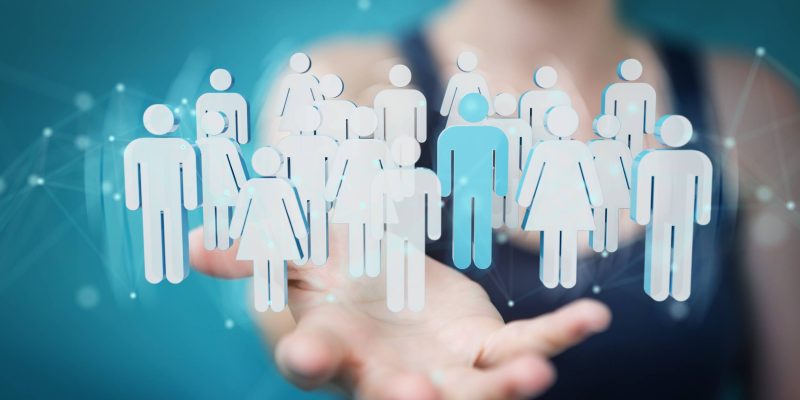 Businesswoman holding group of people 3D rendering avocat crowdsourcing