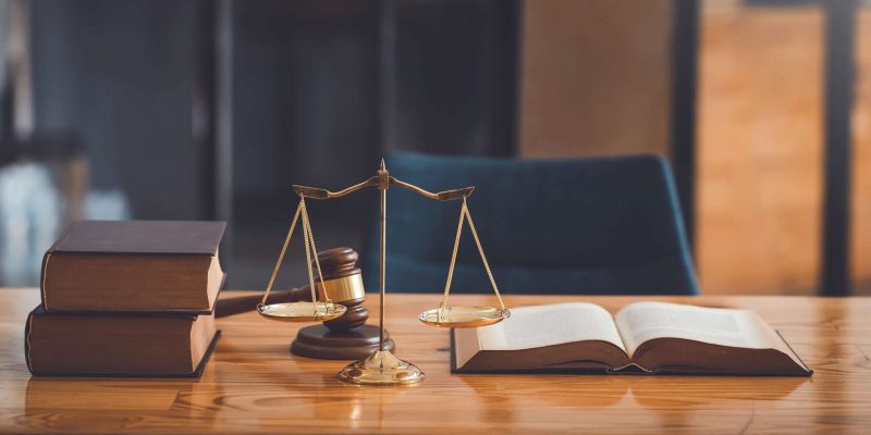 Lawyer desk in the office. justice law concept. coffre-fort